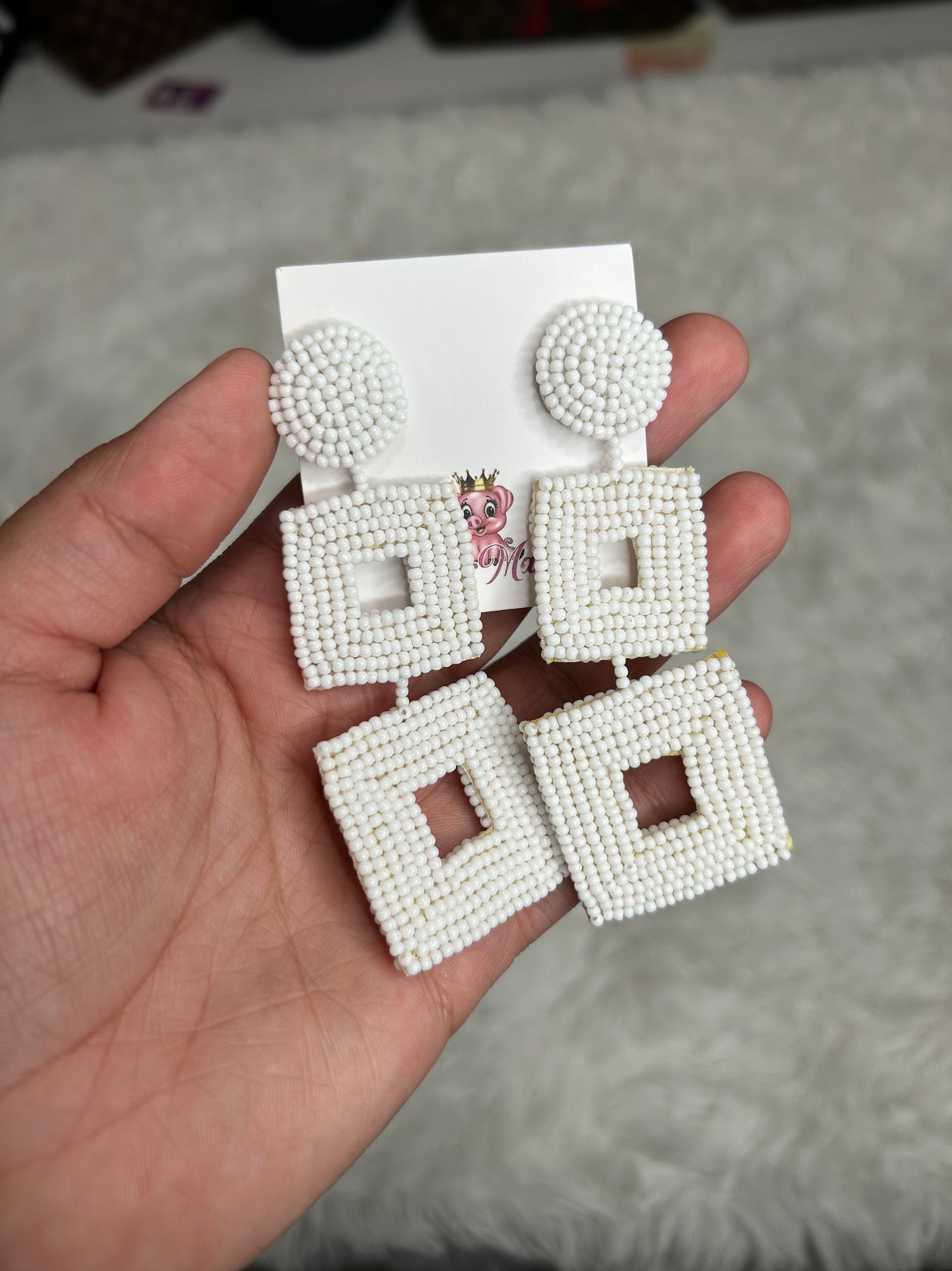 Beaded white statement earrings
