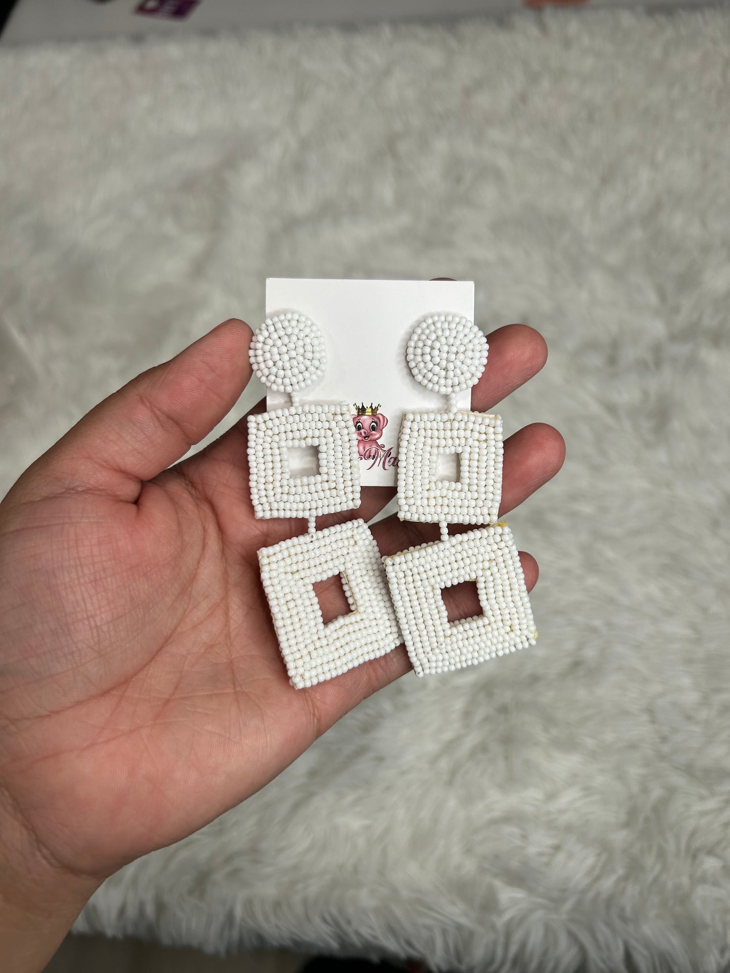 Beaded white statement earrings